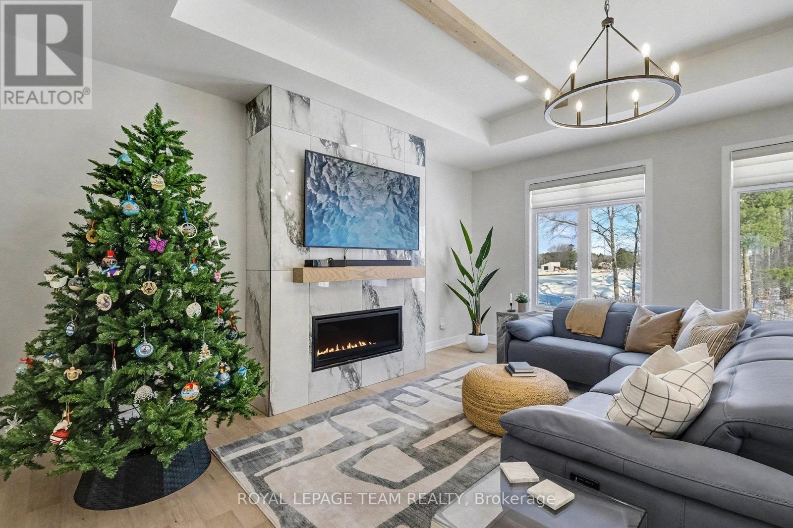 1685 Trizisky Street, North Dundas, ON - Indoor Photo Showing Living Room With Fireplace