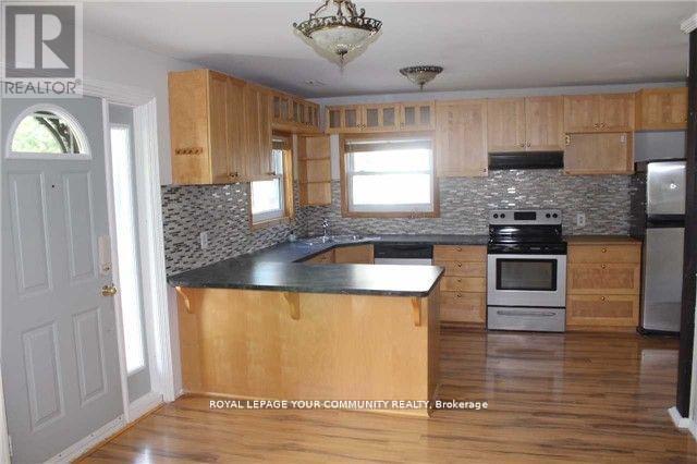 303 Kenwood Avenue, Georgina, ON - Indoor Photo Showing Kitchen With Double Sink