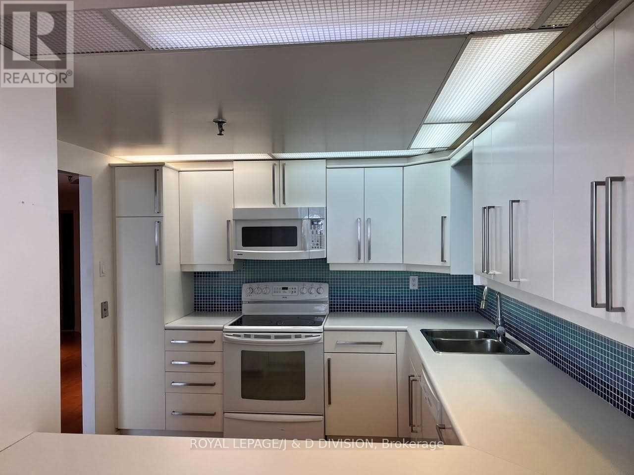 712 - 71 Front Street E, Toronto, ON - Indoor Photo Showing Kitchen With Double Sink