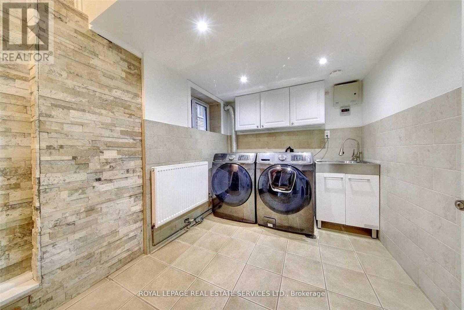 Lower - 87 Dawes Road, Toronto, ON - Indoor Photo Showing Laundry Room