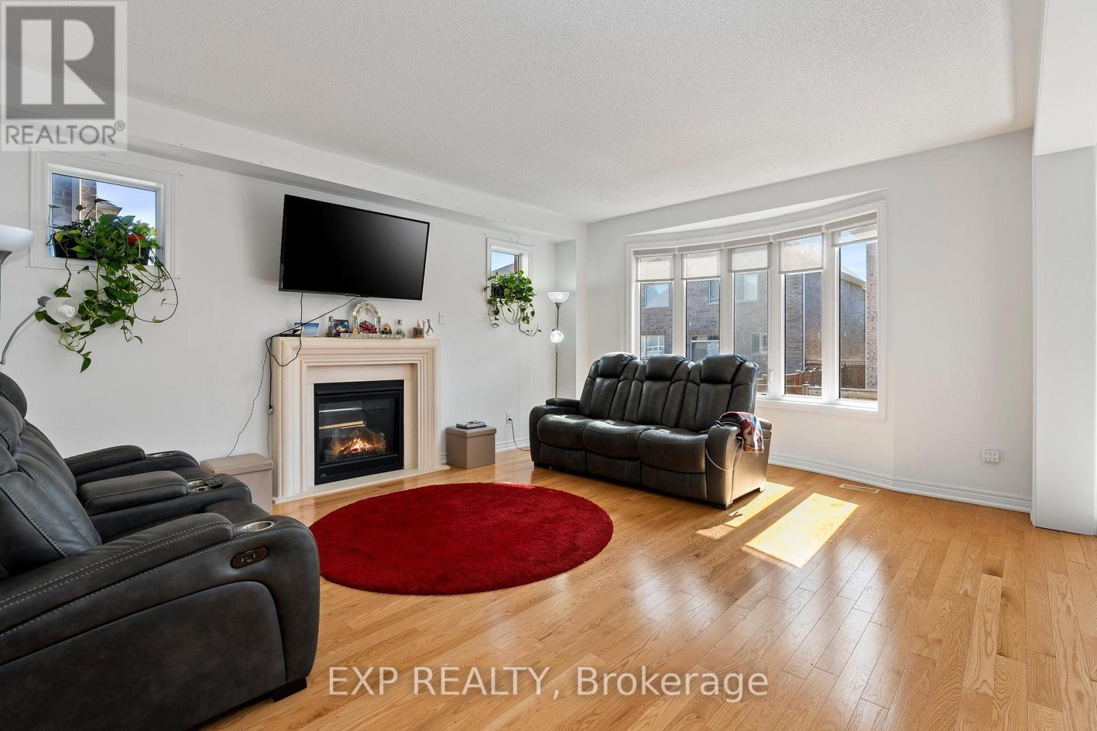 52 John Link Avenue, Georgina, ON - Indoor Photo Showing Living Room With Fireplace