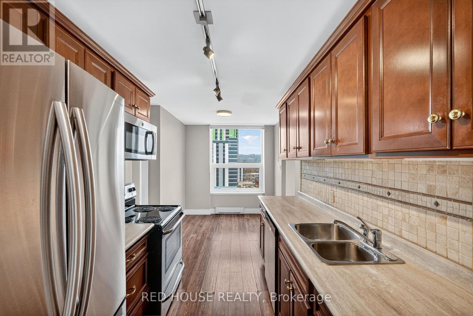 1404 - 75 Queen Street N, Hamilton, ON - Indoor Photo Showing Kitchen With Double Sink