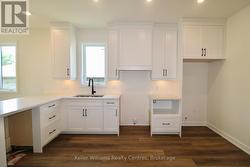 Photo of home by builder with similar layout -