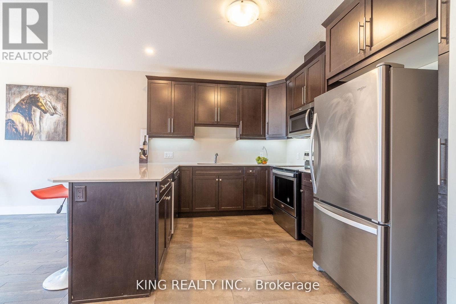 135 - 1960 Dalmagarry Road E, London North, ON - Indoor Photo Showing Kitchen