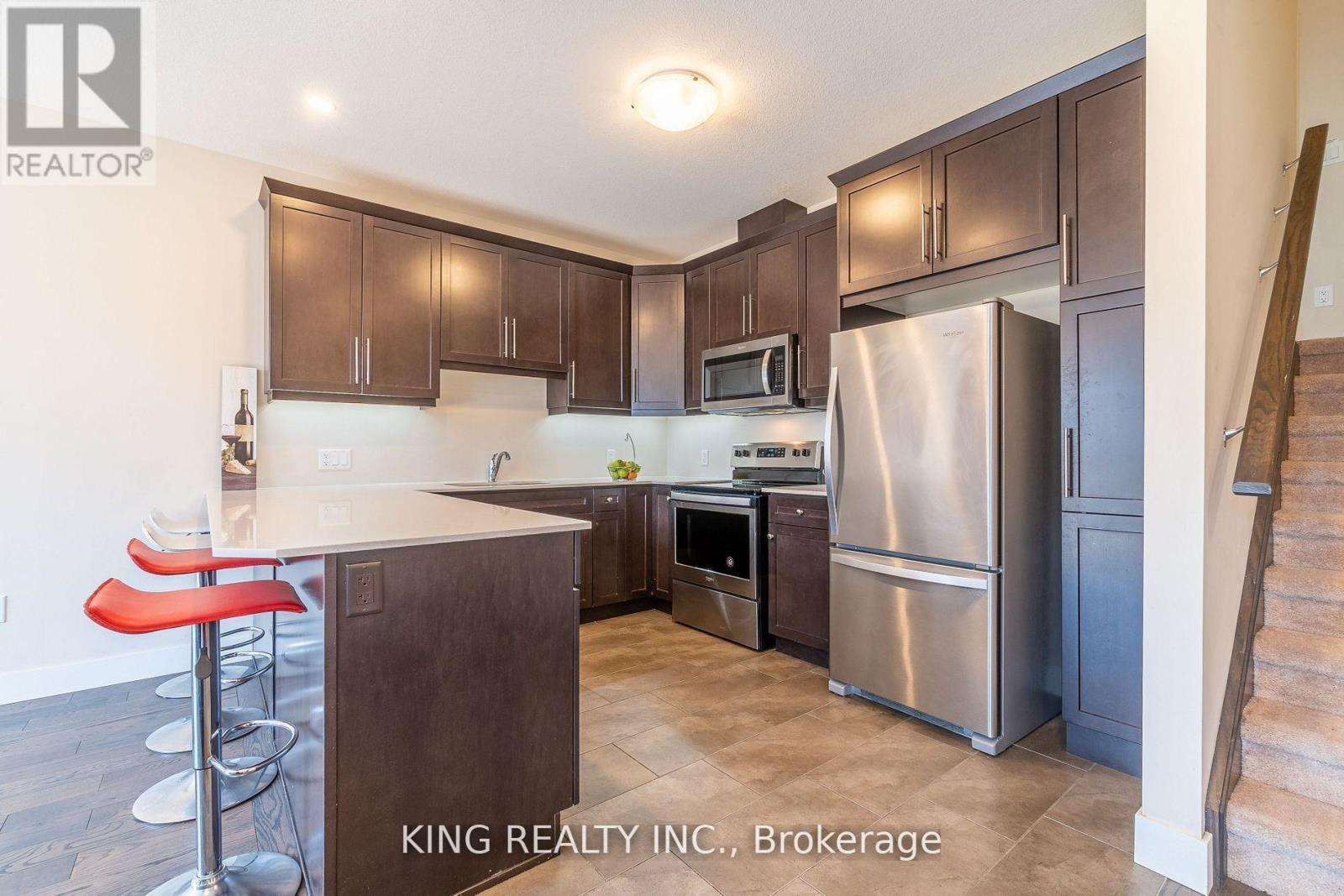 135 - 1960 Dalmagarry Road E, London North, ON - Indoor Photo Showing Kitchen