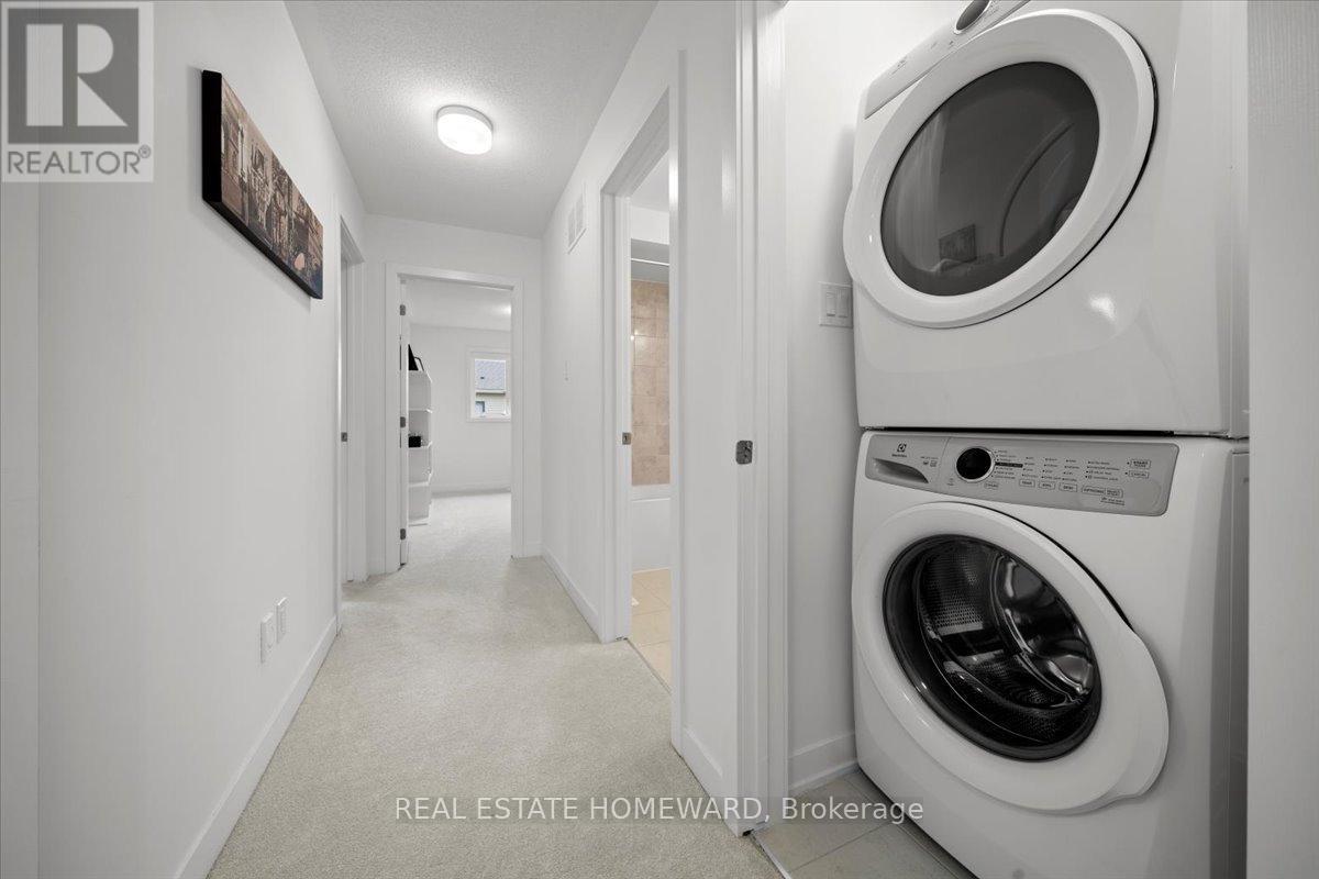 52 Kindred Row, Ottawa, ON - Indoor Photo Showing Laundry Room