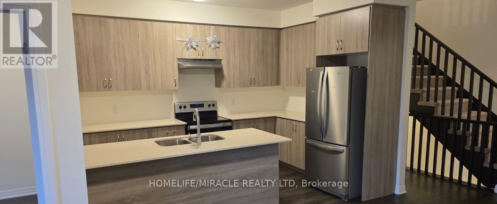 914 - 585 Colborne Street, Brantford, ON - Indoor Photo Showing Kitchen With Stainless Steel Kitchen