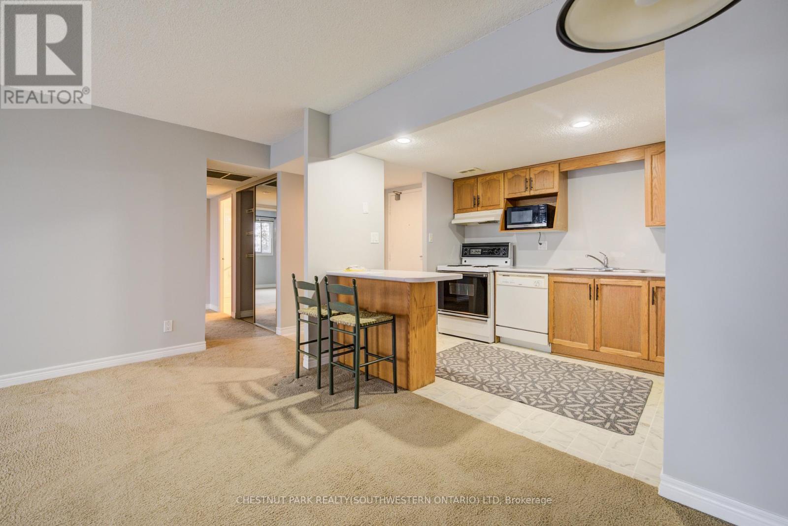 507 - 260 Sheldon Avenue N, Kitchener, ON - Indoor Photo Showing Kitchen With Double Sink