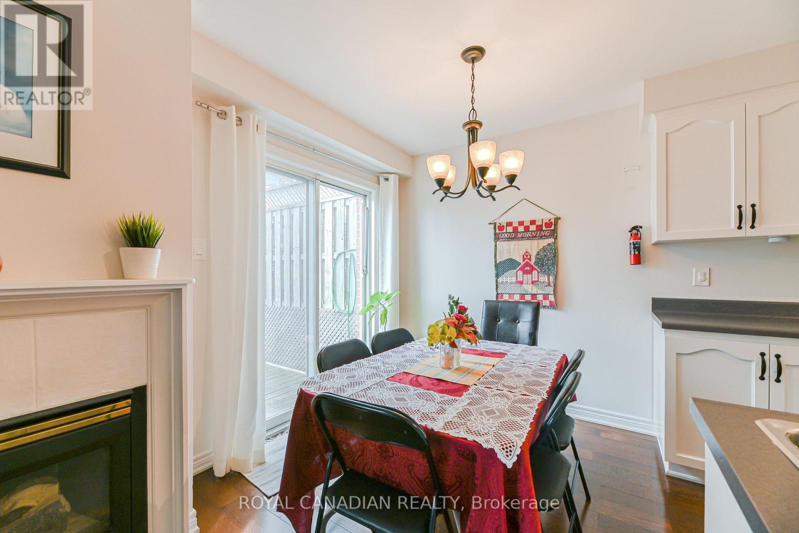53 - 311 Highway 8, Hamilton, ON - Indoor Photo Showing Dining Room With Fireplace