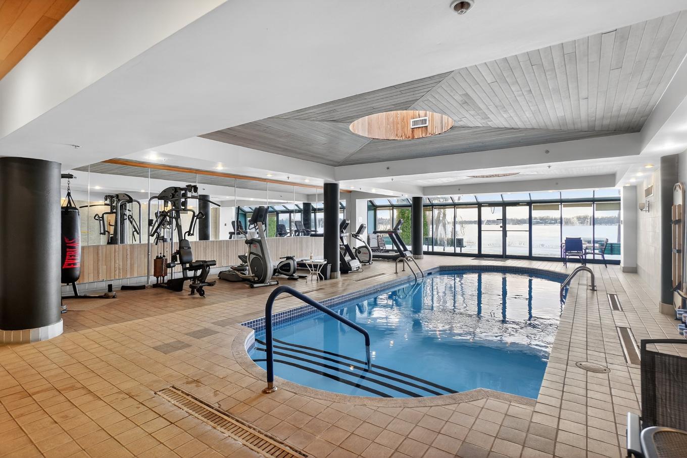 Pool - 702-160 Ch. De La Rive-Boisée, Montréal (Pierrefonds-Roxboro), QC - Indoor Photo Showing Other Room With In Ground Pool