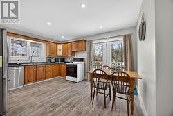 Bright eat-in kitchen with garden doors to deck -