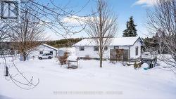 Back of house leads to rear door & large deck -