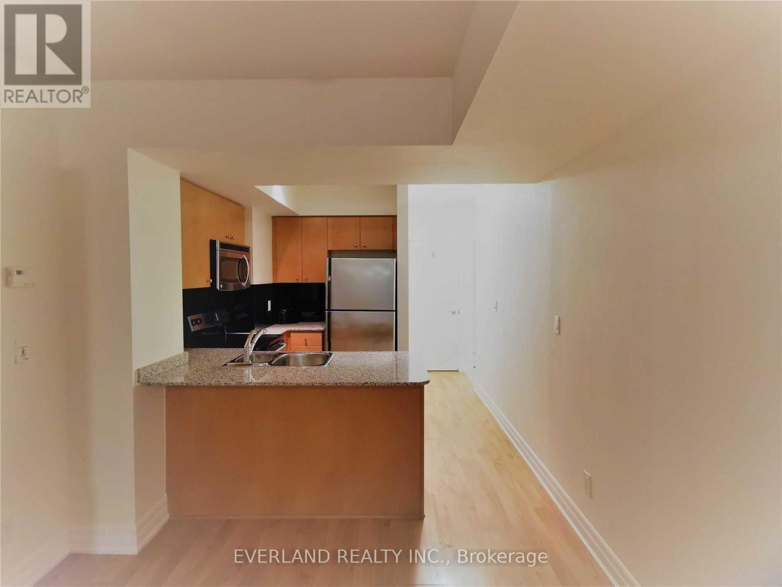 409 - 8 Scollard Street, Toronto, ON - Indoor Photo Showing Kitchen With Double Sink