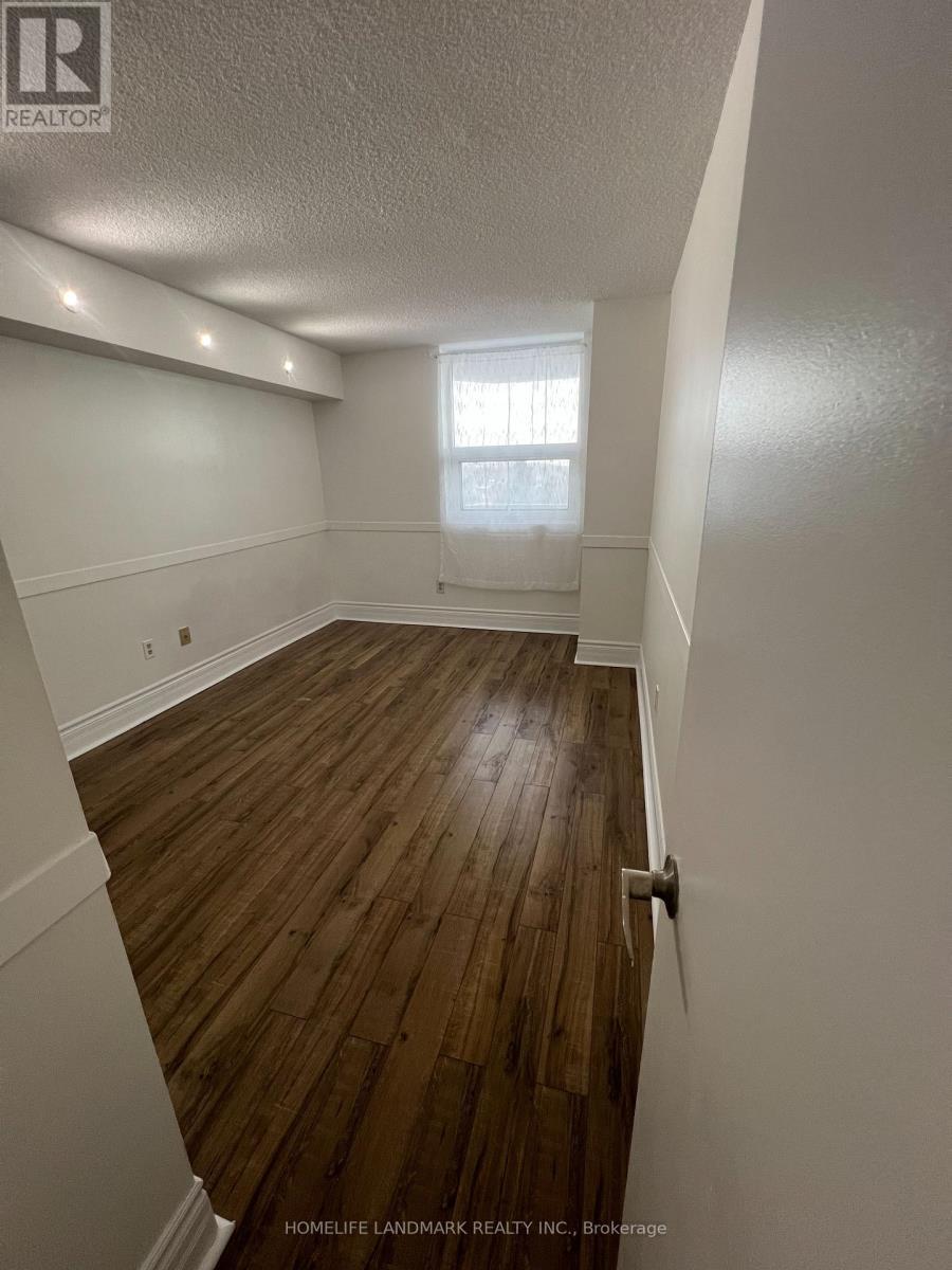 407 - 10 Dean Park Road, Toronto, ON - Indoor Photo Showing Other Room