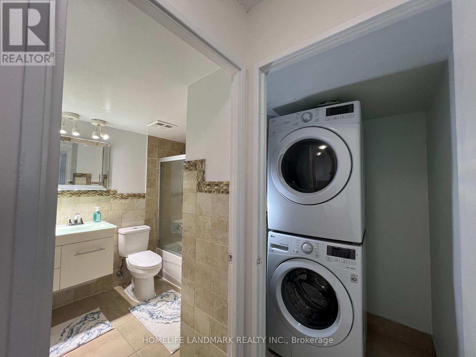 407 - 10 Dean Park Road, Toronto, ON - Indoor Photo Showing Laundry Room