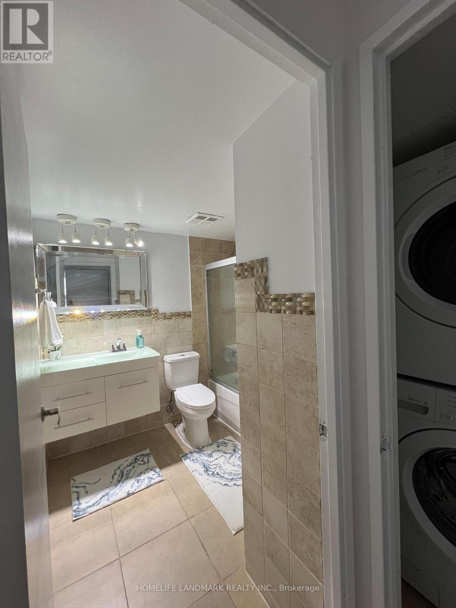 407 - 10 Dean Park Road, Toronto, ON - Indoor Photo Showing Laundry Room