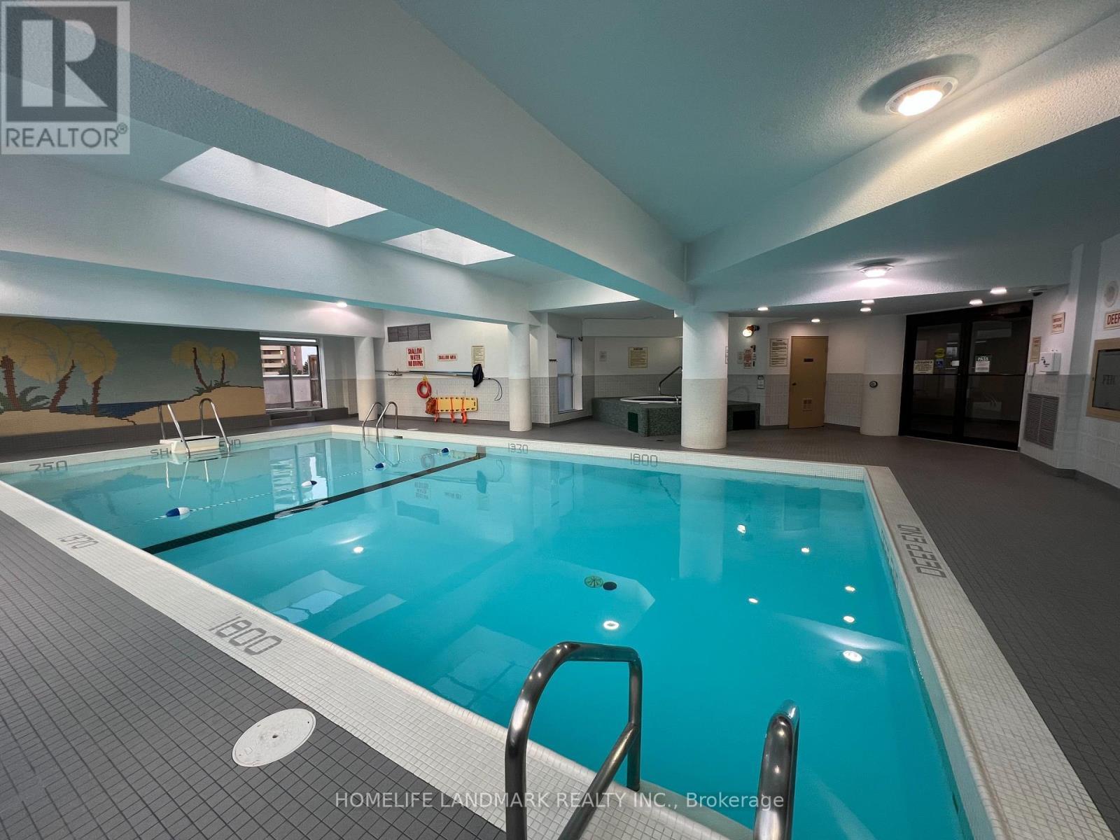 407 - 10 Dean Park Road, Toronto, ON - Indoor Photo Showing Other Room With In Ground Pool