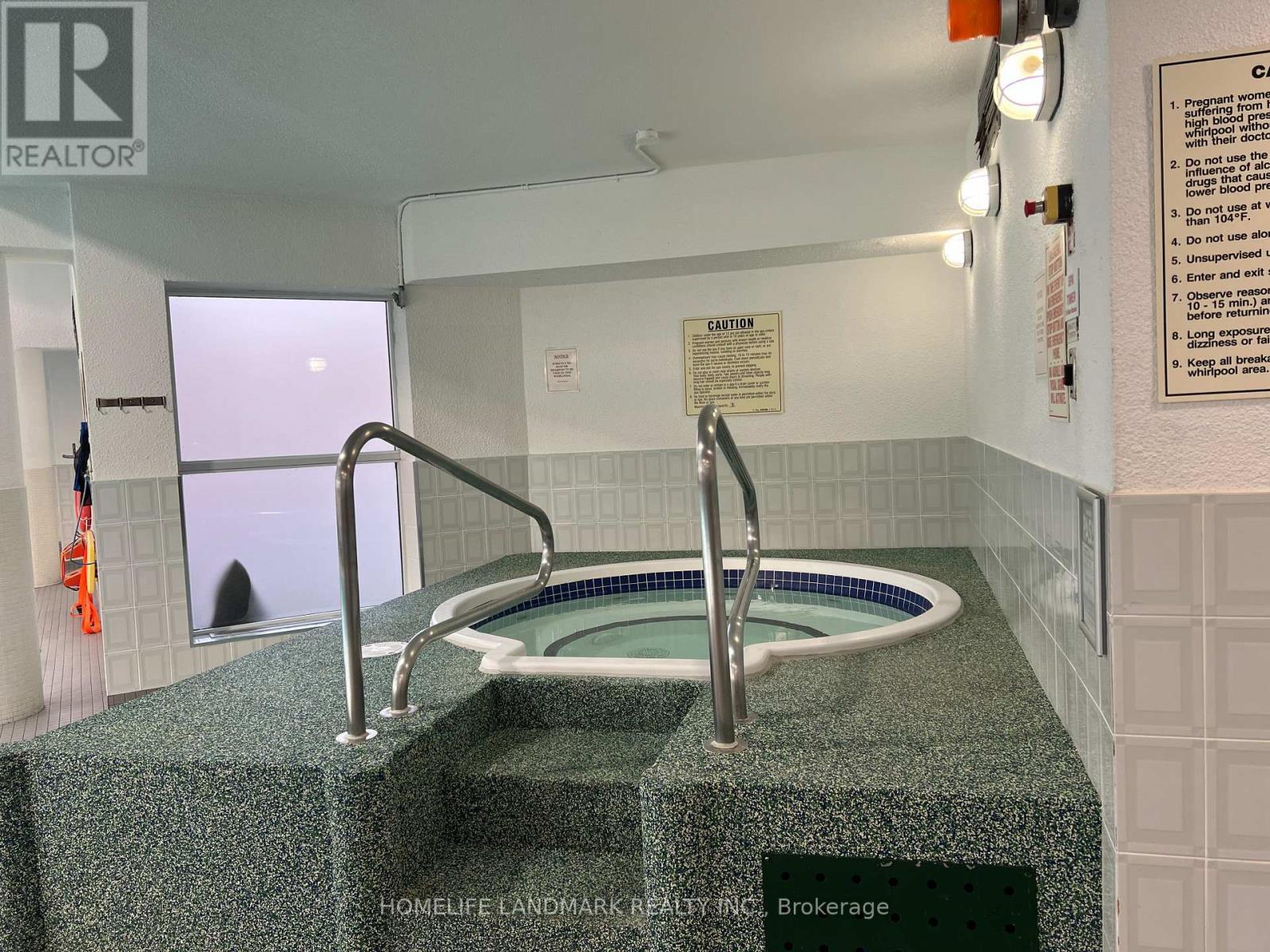 407 - 10 Dean Park Road, Toronto, ON - Indoor Photo Showing Other Room With In Ground Pool