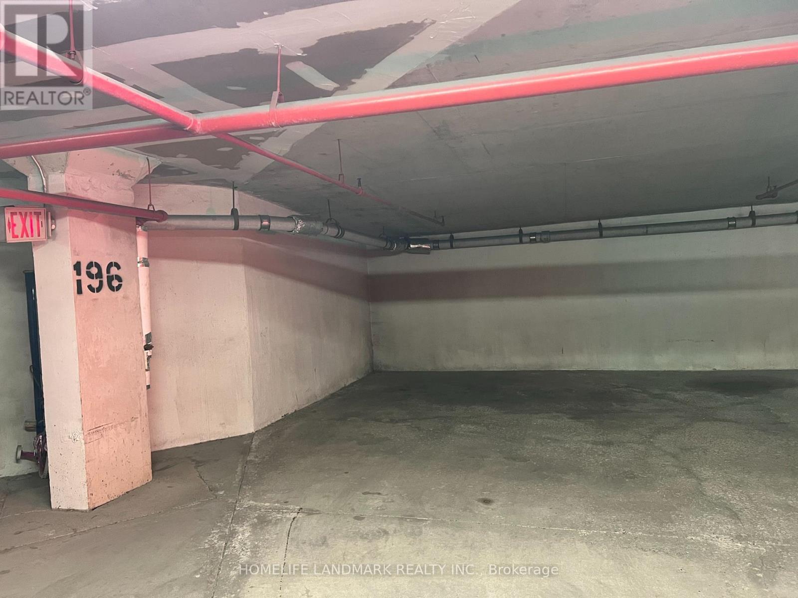 407 - 10 Dean Park Road, Toronto, ON - Indoor Photo Showing Garage