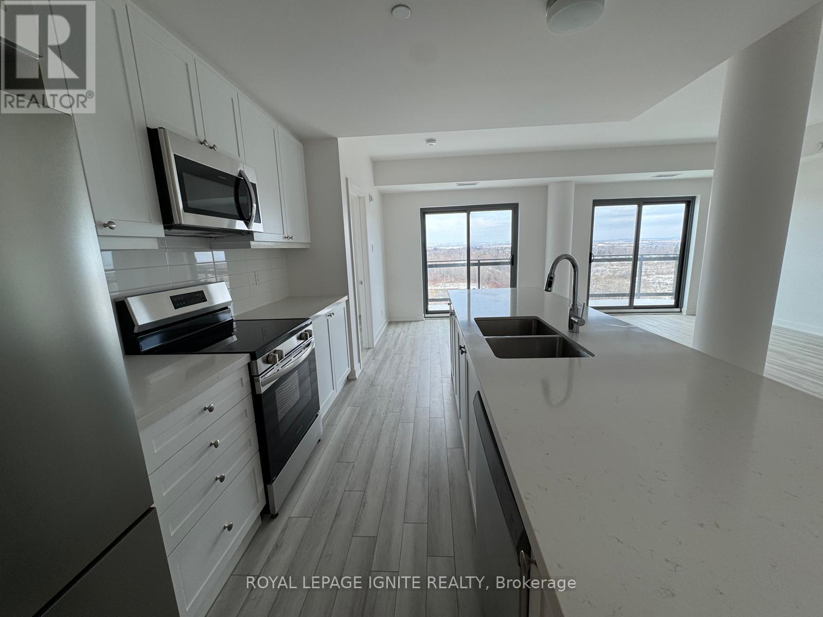 1205 - 55 Clarington Boulevard, Clarington, ON - Indoor Photo Showing Kitchen With Double Sink With Upgraded Kitchen