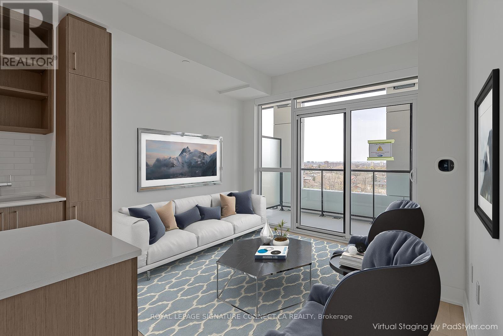 620 - 50 George Butchart Drive, Toronto, ON - Indoor Photo Showing Living Room