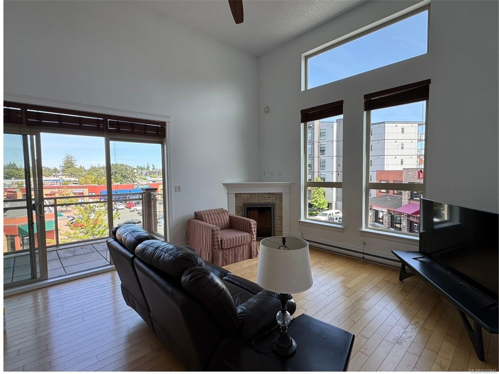 307-751 Goldstream Ave, Langford, BC - Indoor Photo Showing Other Room With Fireplace