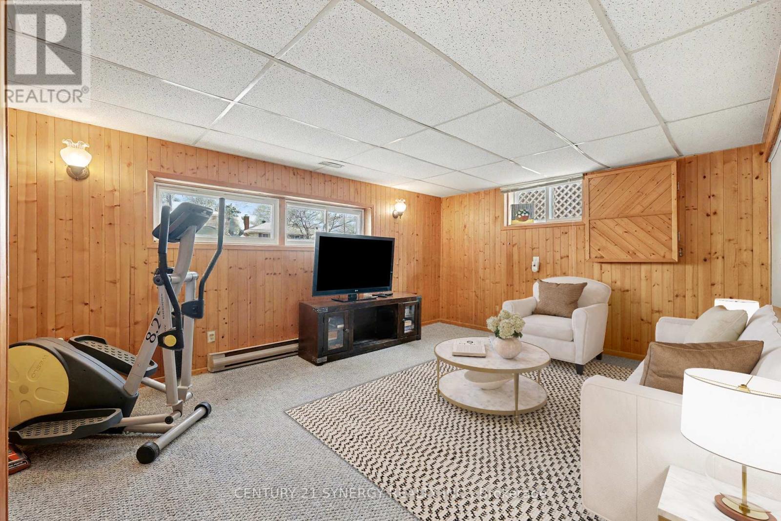 This photo has been virtually staged. - 1350 Linden Crescent, Brockville, ON - Indoor Photo Showing Gym Room