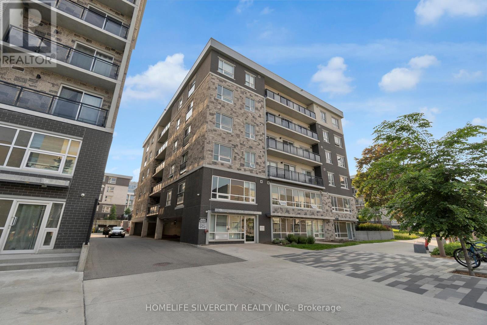 A405 - 275 Larch Street, Waterloo, ON - Outdoor With Balcony With Facade