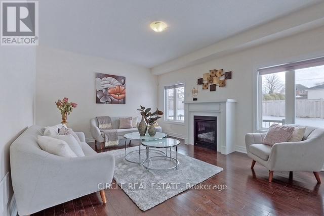 Upper Level - 213 Danny Wheeler Boulevard, Georgina, ON - Indoor Photo Showing Living Room With Fireplace