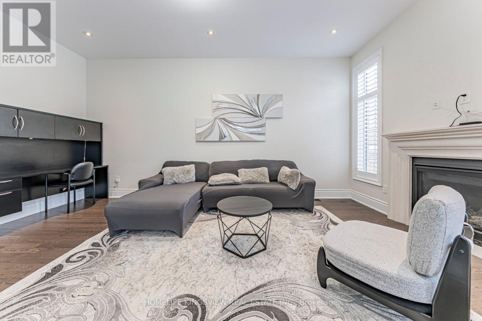 61 Ross Vennare Crescent, Vaughan, ON - Indoor Photo Showing Living Room With Fireplace