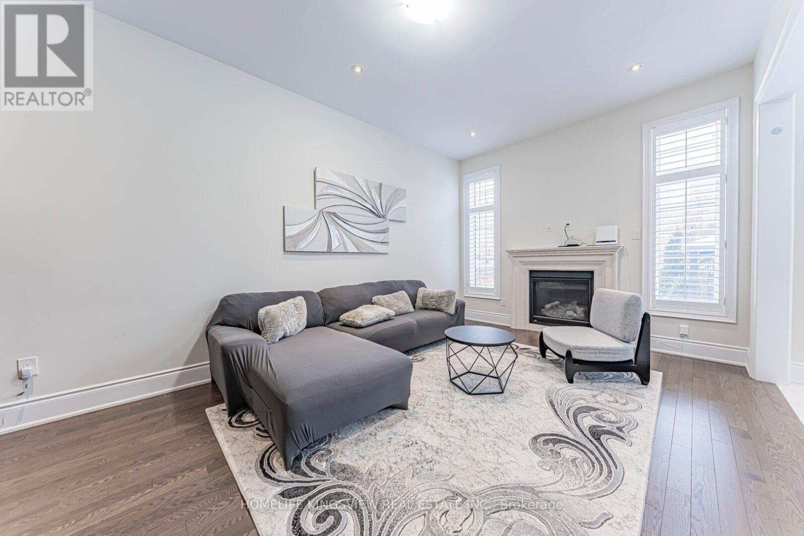 61 Ross Vennare Crescent, Vaughan, ON - Indoor Photo Showing Living Room With Fireplace