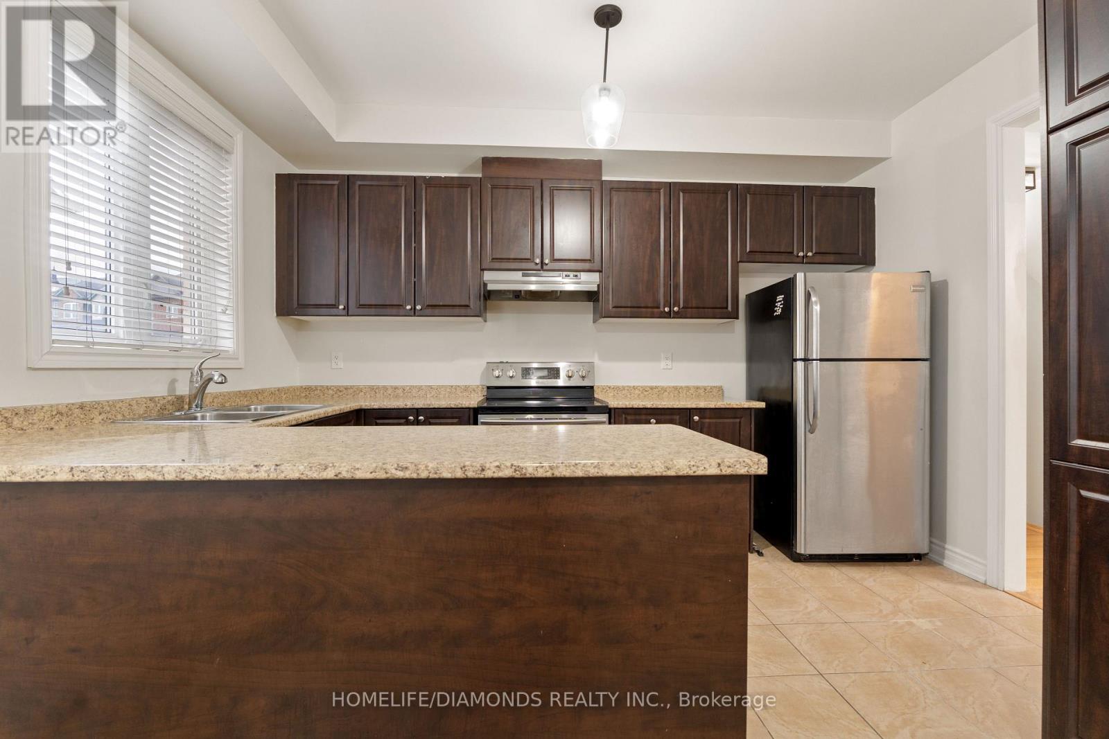 43 Sprucewood Road, Brampton, ON - Indoor Photo Showing Kitchen With Double Sink