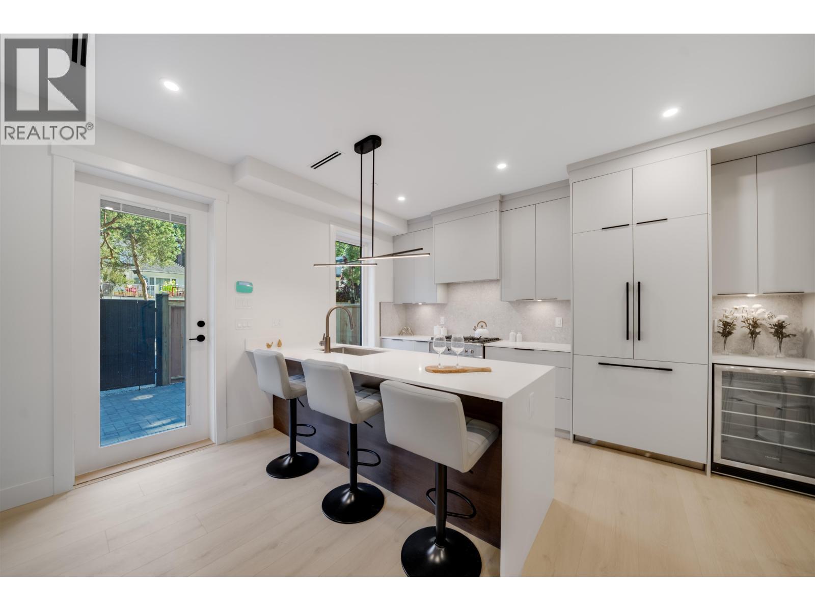 4 3836 W 8Th Avenue, Vancouver, BC - Indoor Photo Showing Kitchen With Upgraded Kitchen