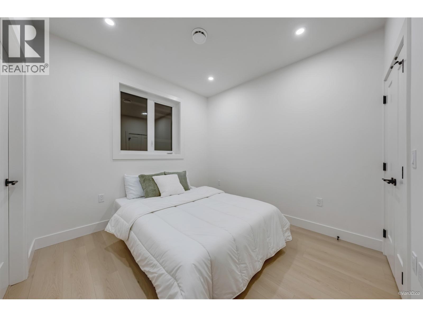 4 3836 W 8Th Avenue, Vancouver, BC - Indoor Photo Showing Bedroom