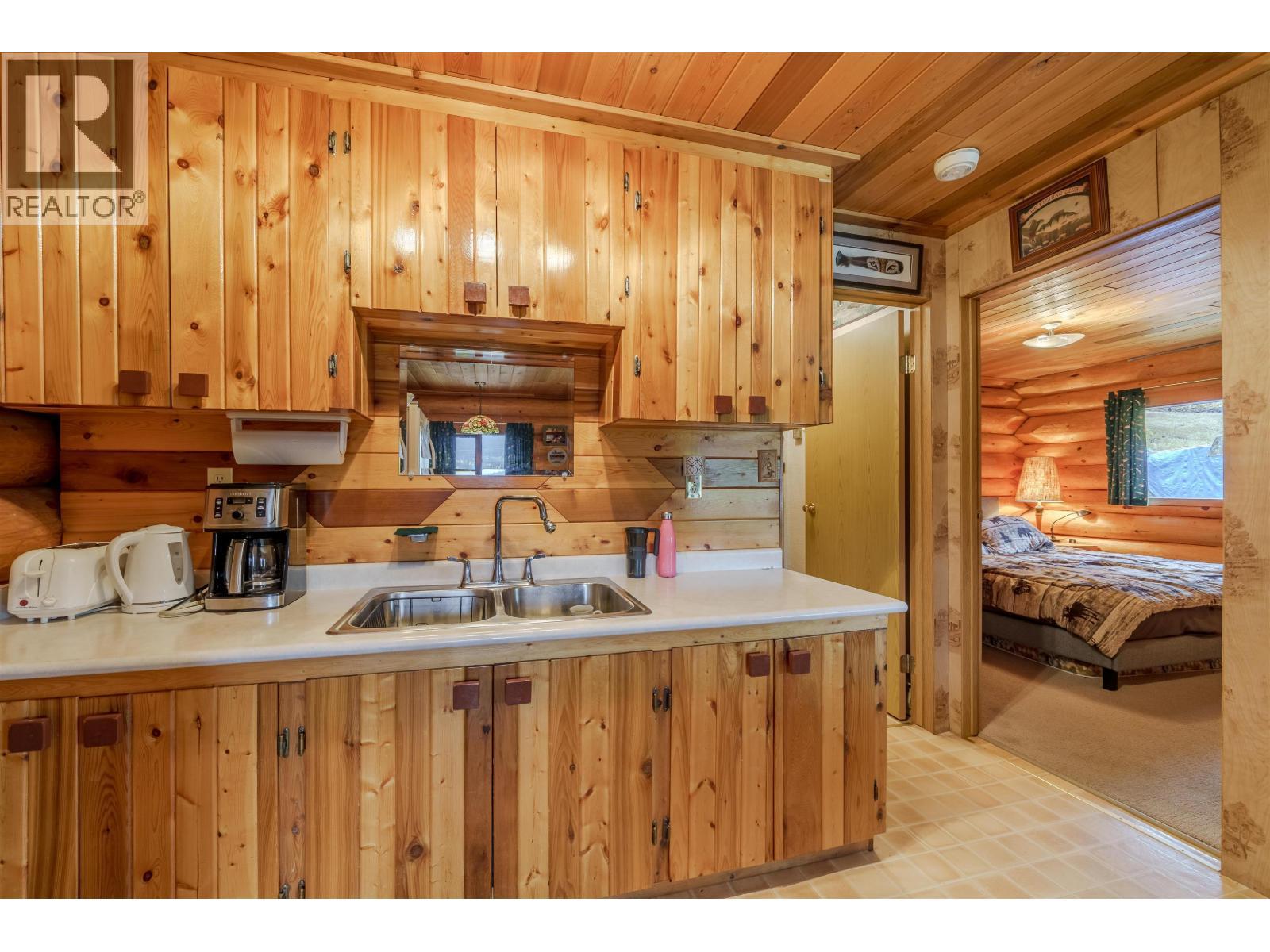 7561 Mccarthy Road, Bridge Lake, BC - Indoor Photo Showing Kitchen With Double Sink