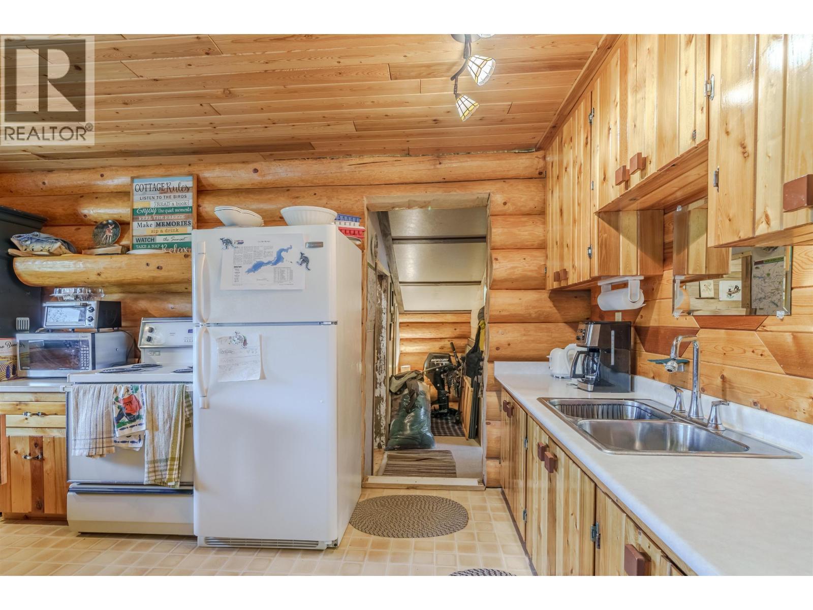 7561 Mccarthy Road, Bridge Lake, BC - Indoor Photo Showing Kitchen With Double Sink