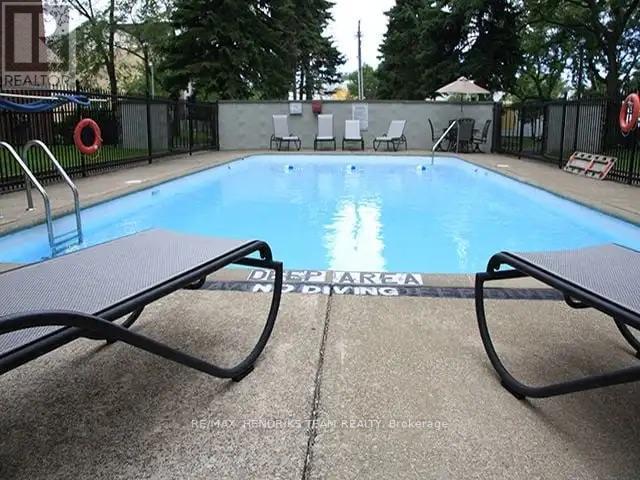 708 - 610 Lake Street, St. Catharines (Lakeport), ON - Outdoor With In Ground Pool With Backyard