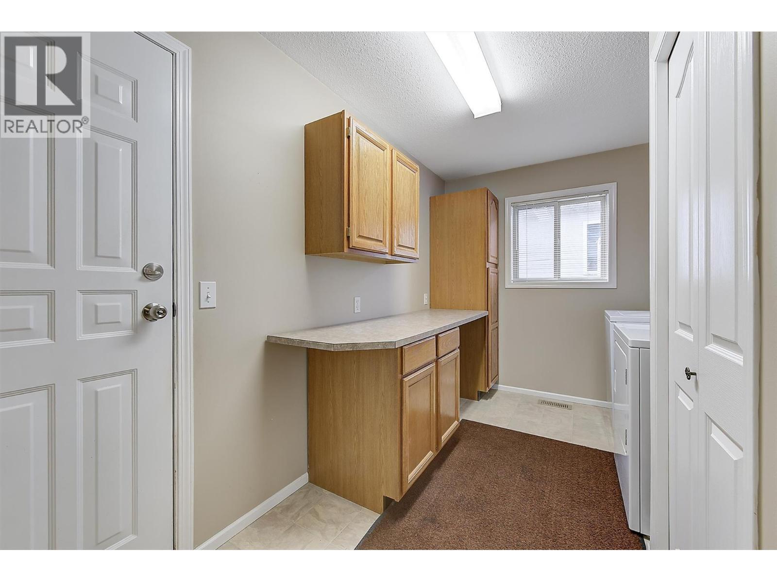 Laundry Room - 2330 Butt Road Unit# 458, West Kelowna, BC - Indoor Photo Showing Other Room