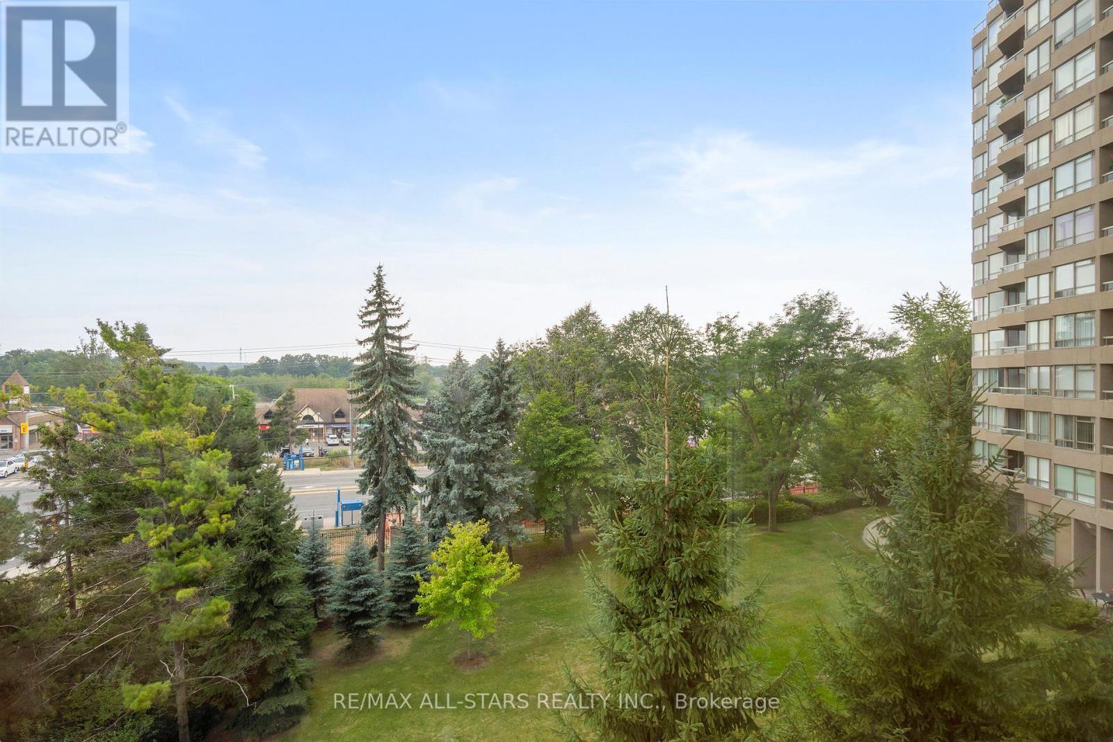 South east view of treetops - 404 - 610 Bullock Drive, Markham, ON - Outdoor With View