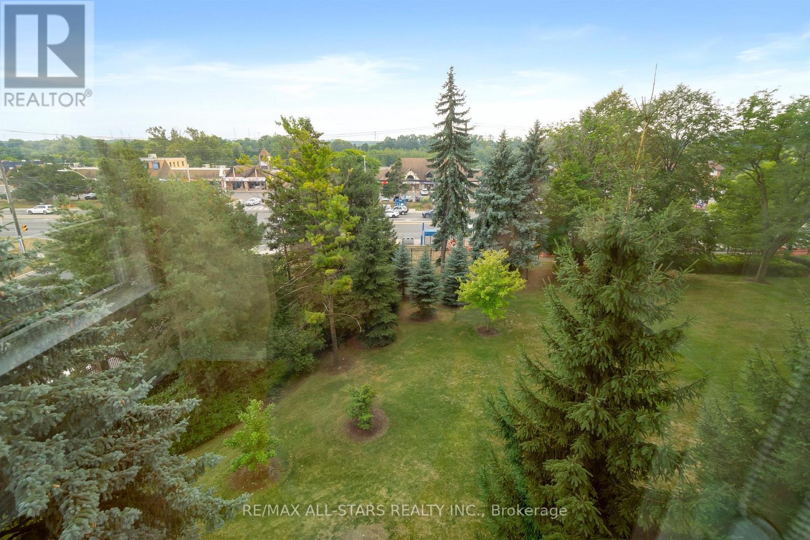 South east view of treetops - 404 - 610 Bullock Drive, Markham, ON - Outdoor With View