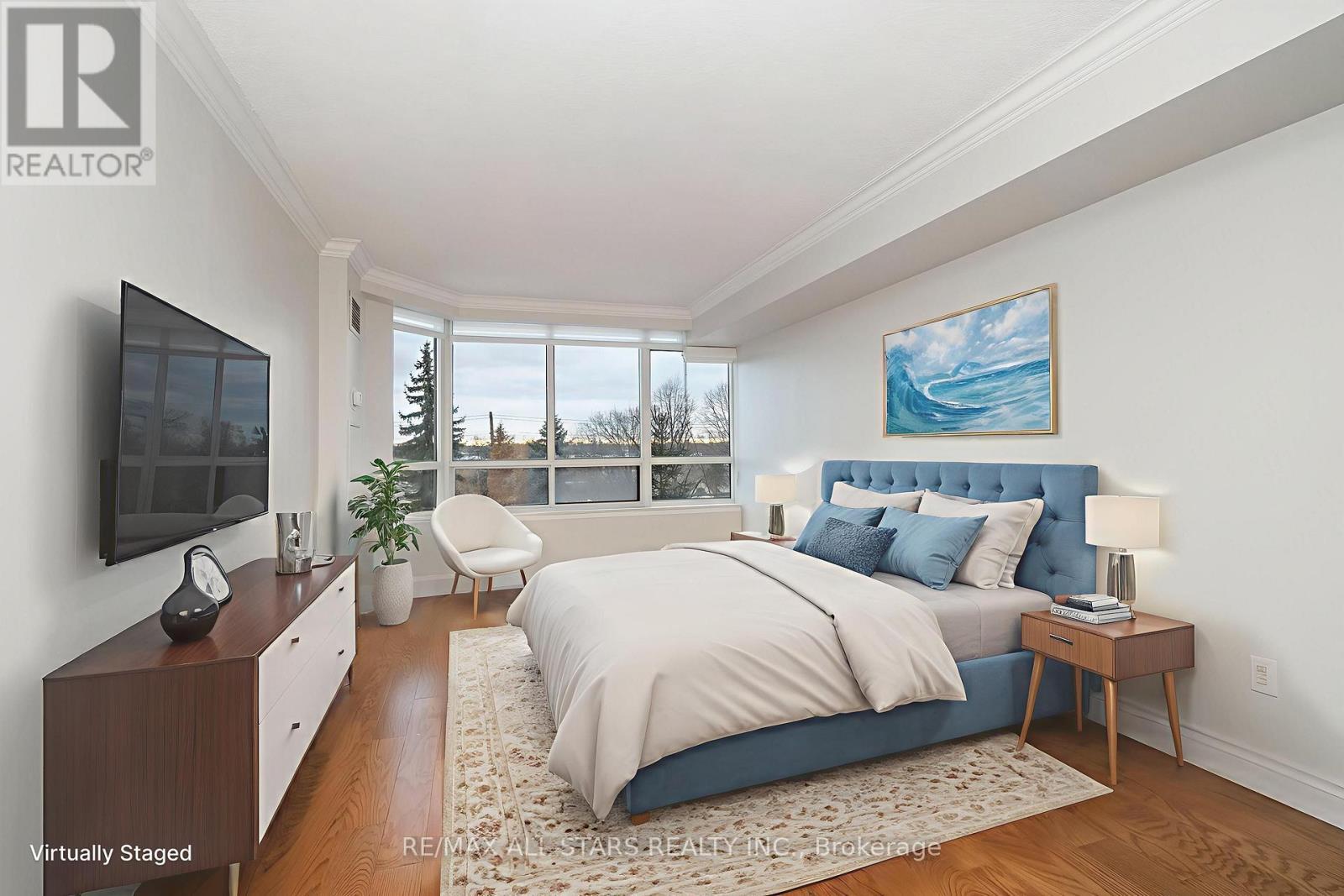 Virtually staged primary bedroom - 404 - 610 Bullock Drive, Markham, ON - Indoor Photo Showing Bedroom