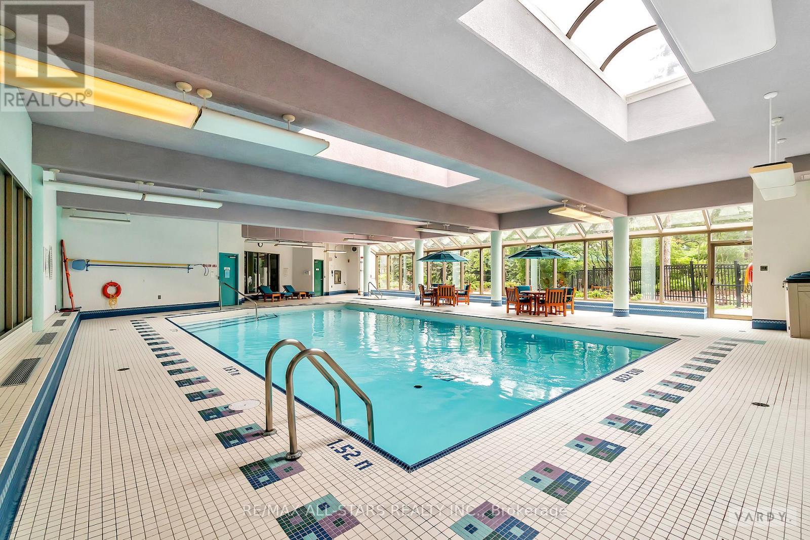 404 - 610 Bullock Drive, Markham, ON - Indoor Photo Showing Other Room With In Ground Pool