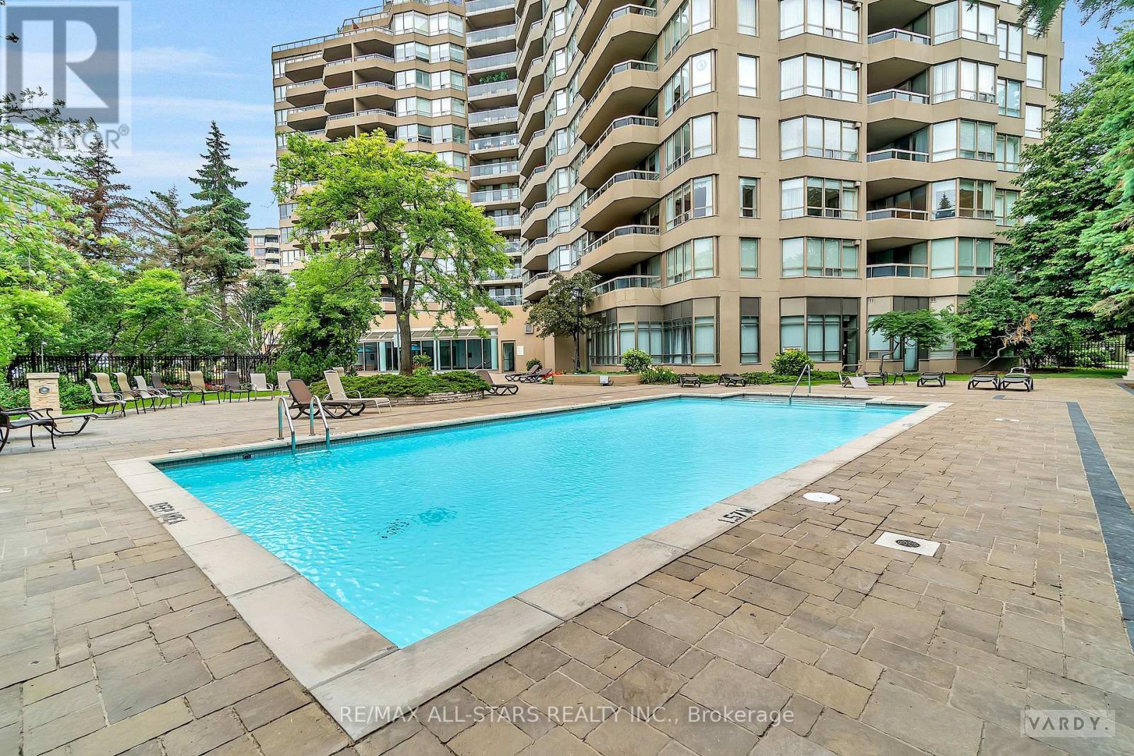 404 - 610 Bullock Drive, Markham, ON - Outdoor With In Ground Pool