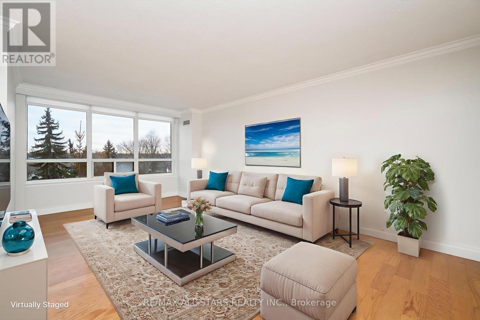 Virtually staged living area - 404 - 610 Bullock Drive, Markham, ON - Indoor Photo Showing Living Room