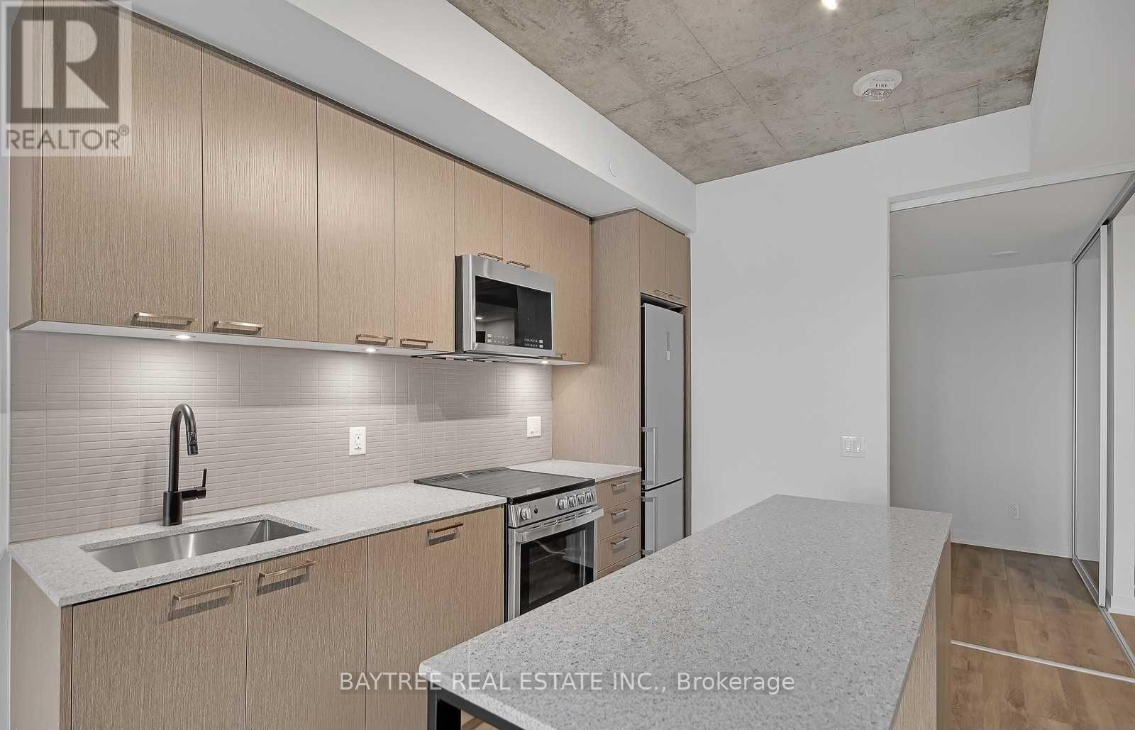 316 - 1808 St Clair Avenue W, Toronto, ON - Indoor Photo Showing Kitchen With Upgraded Kitchen