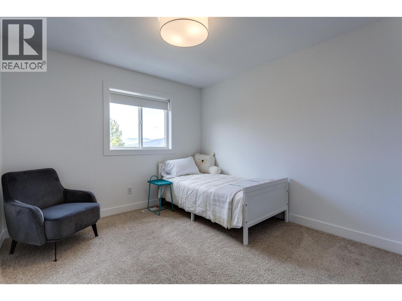 2nd main home bedroom - 388 Mccarren Avenue, Kelowna, BC - Indoor Photo Showing Bedroom
