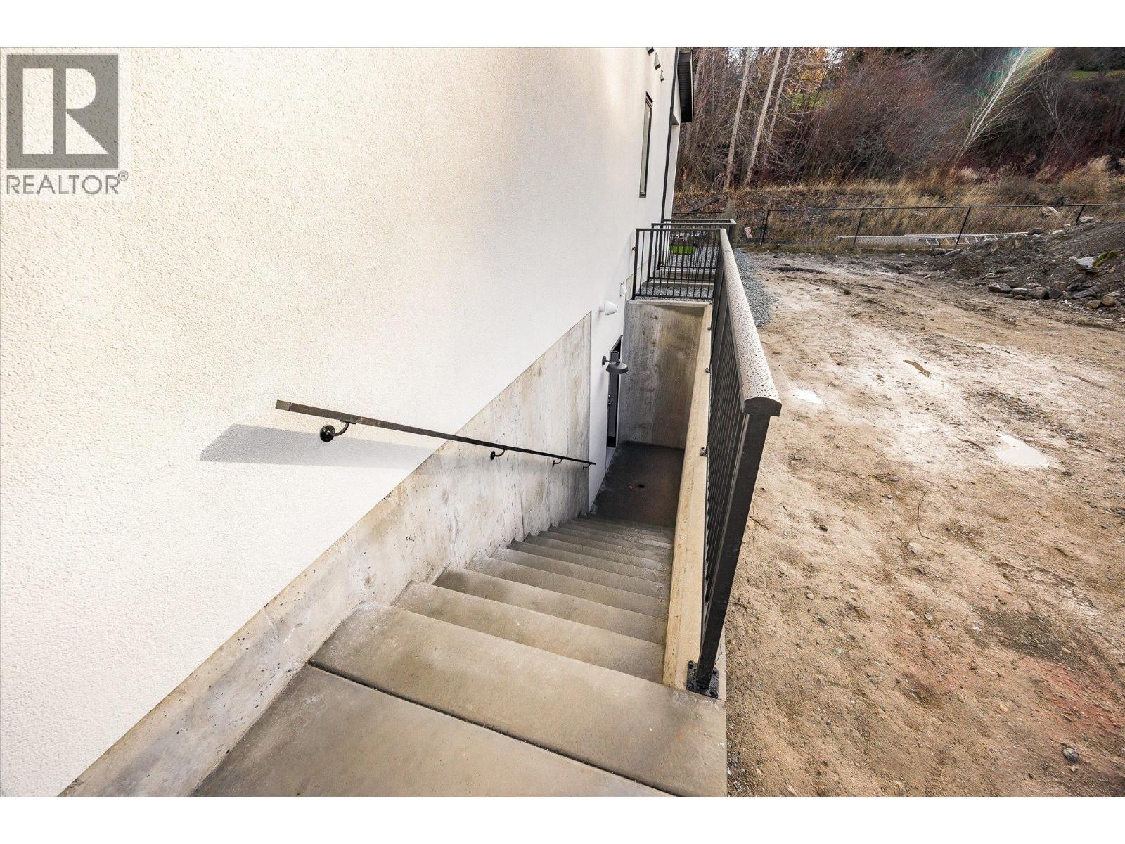 downstairs to the unfinished basement - see floor plans in 5 clicks... - 980 Bull Crescent, Kelowna, BC - Photo Showing Other Room