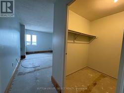 Bedroom with walk-in closet -