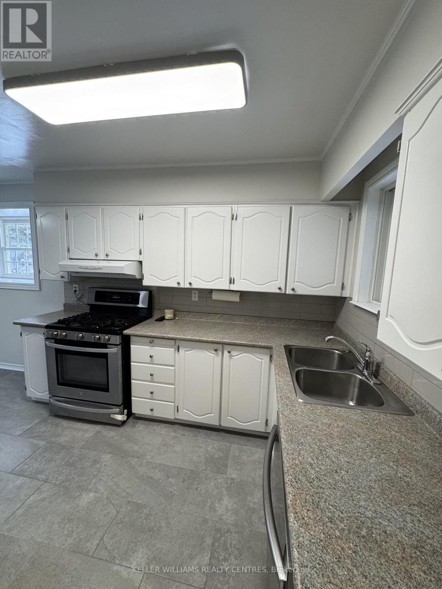 Main - 691 Irwin Crescent, Newmarket, ON - Indoor Photo Showing Kitchen With Double Sink
