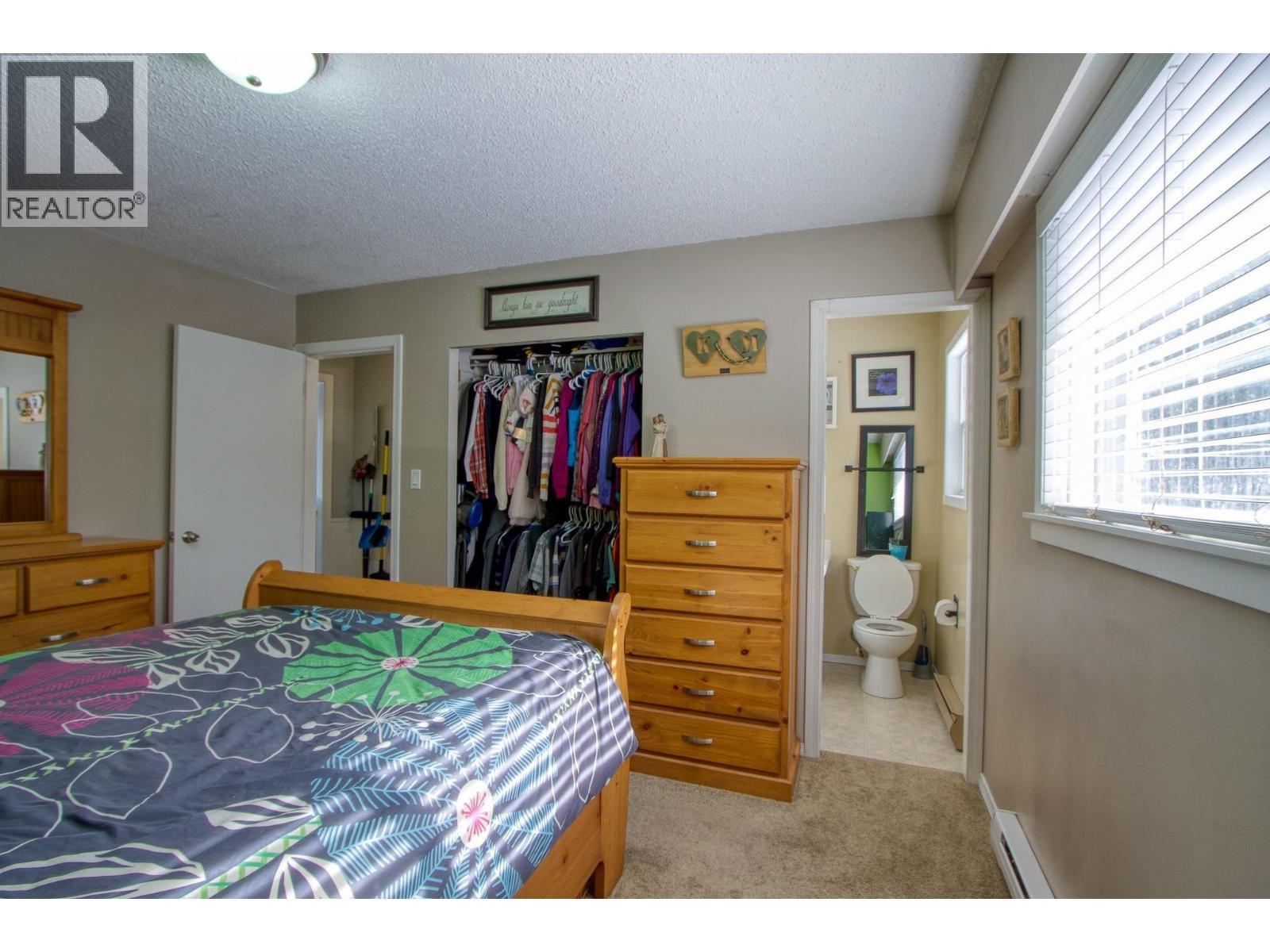 5047 Easzee Drive, 108 Mile Ranch, BC - Indoor Photo Showing Bedroom